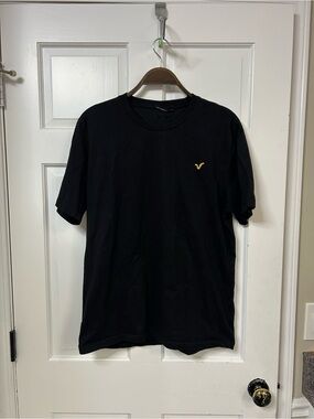 Men's Black Short-Sleeve Crewneck T-Shirt with Small Yellow Emblem
